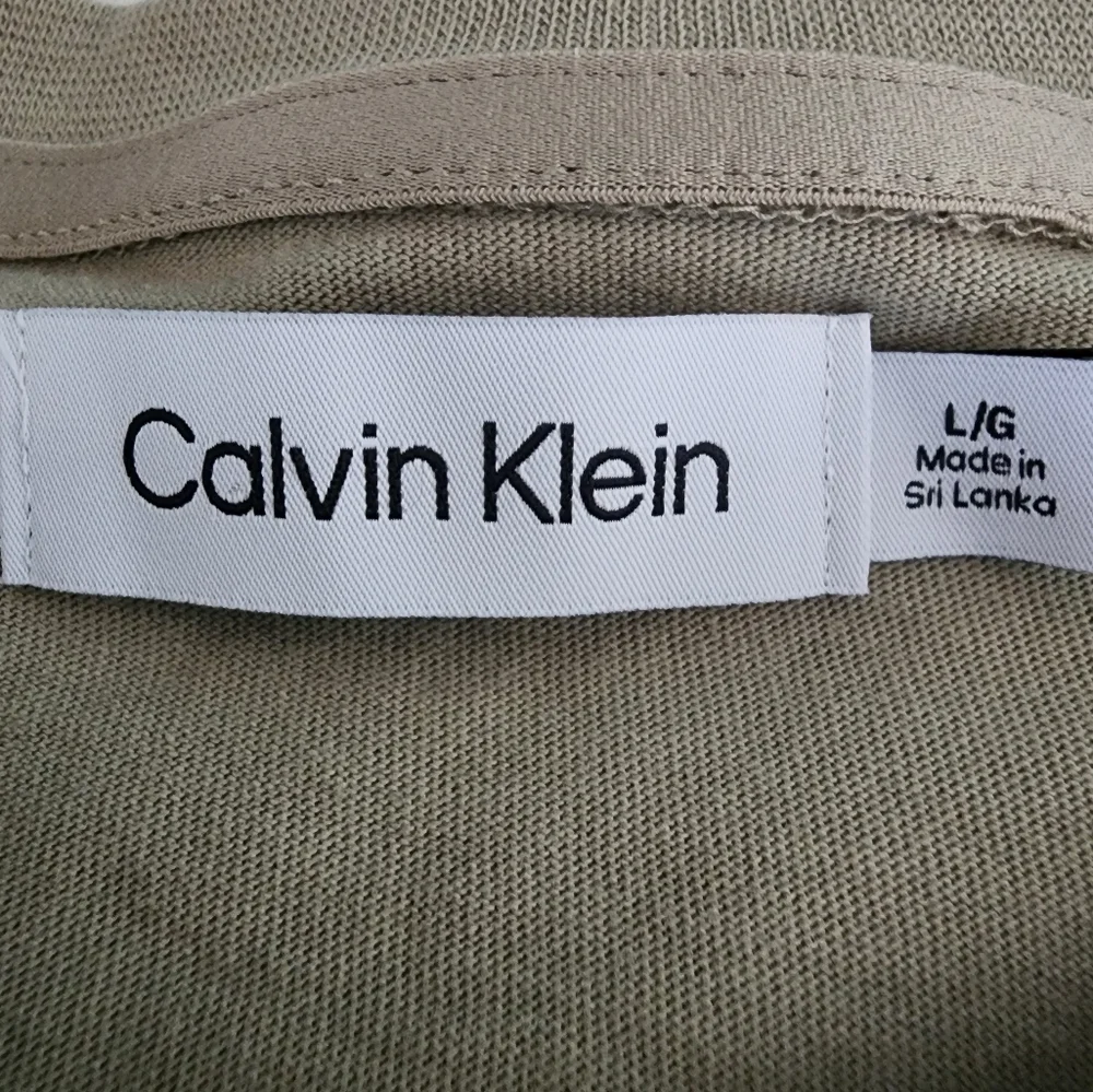 Calvin Klein T shirt men's size L light brown short sleeve smooth cotton
